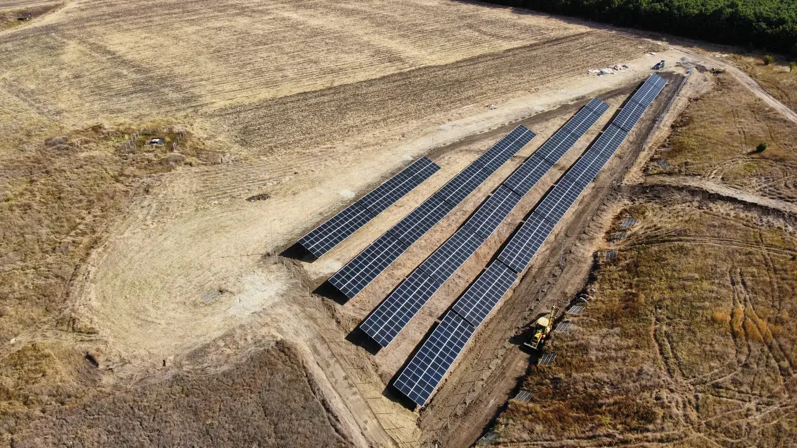 Rows of solar panels at a solar park in Vâlcea County, Romania